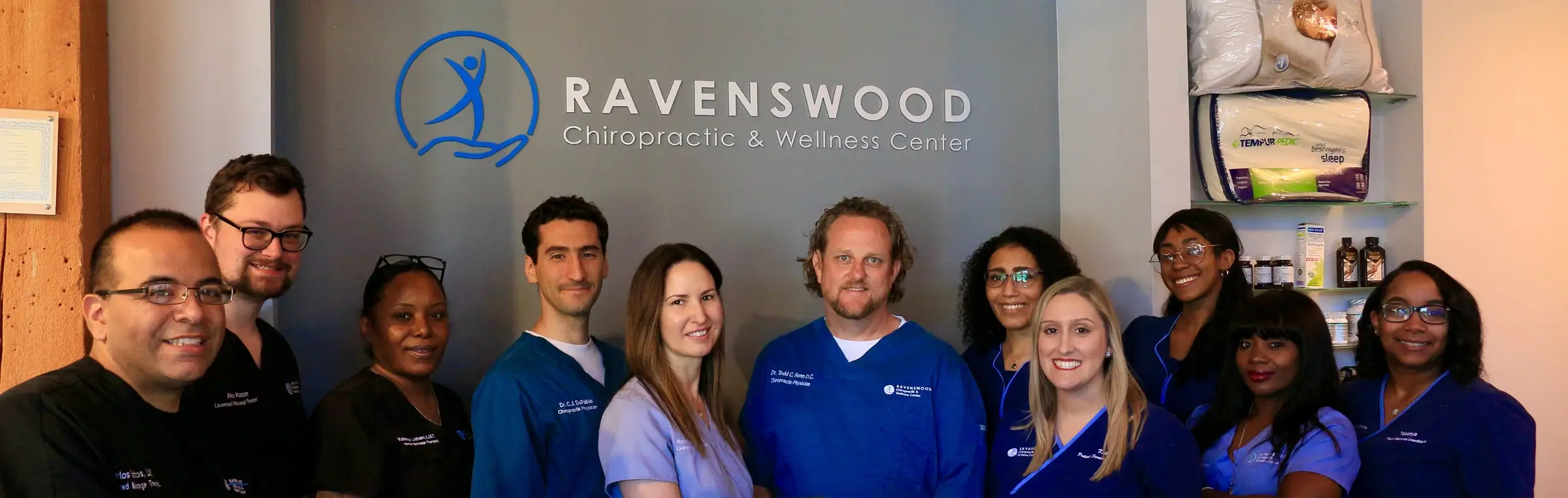 The team at Ravenswood Chiropractic in Chicago pose for a photo in the front office at our location in Chicago, Il. Taken in 2022.
